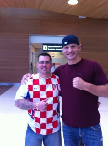 Tomislav Magdic (Cripplers Exclusive Cameraman) greeting Stipe Miocic at the Winnipeg Airport