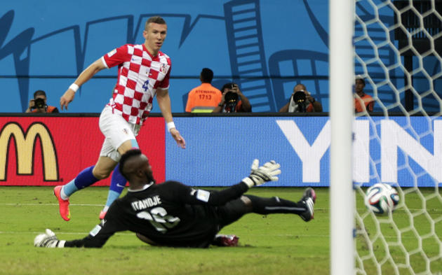 Ivan Perisic (4) scores against Cameroon at the 2014 World Cup